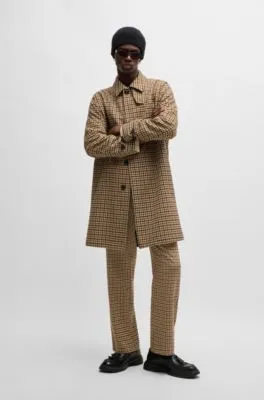 Houndstooth-check coat with concealed closure