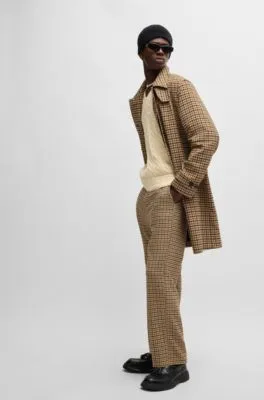 Houndstooth-check coat with concealed closure