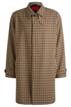 Houndstooth-check coat with concealed closure