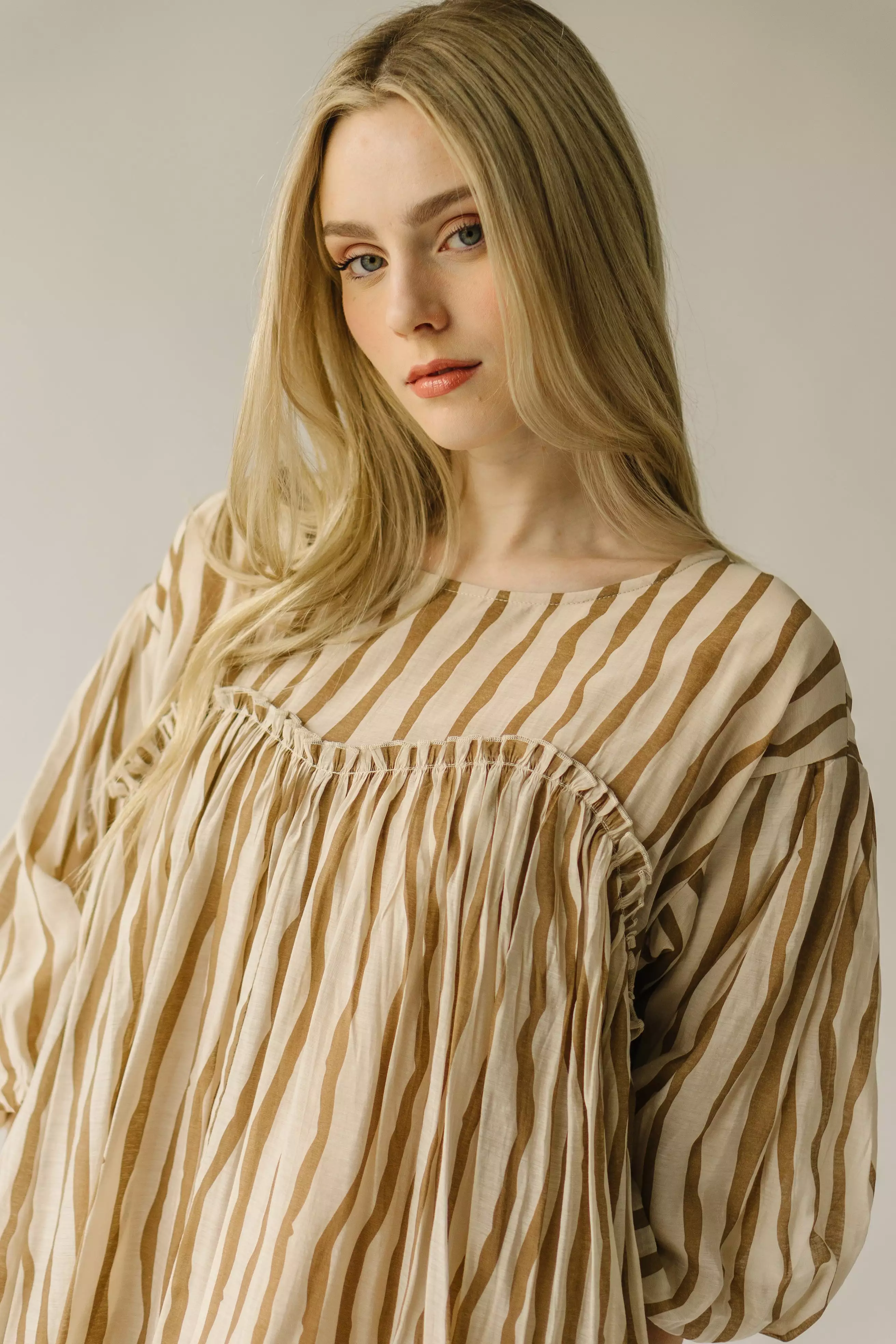 The Pampa Bubble Sleeve Babydoll Dress in Mocha Stripe