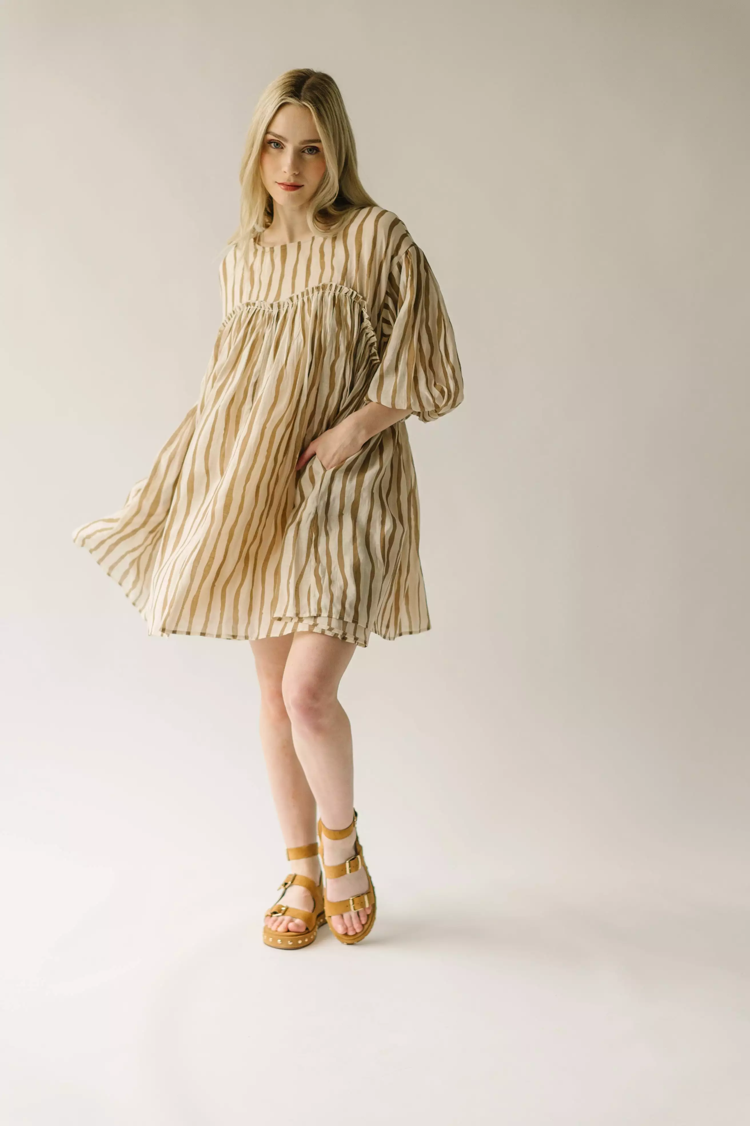 The Pampa Bubble Sleeve Babydoll Dress in Mocha Stripe