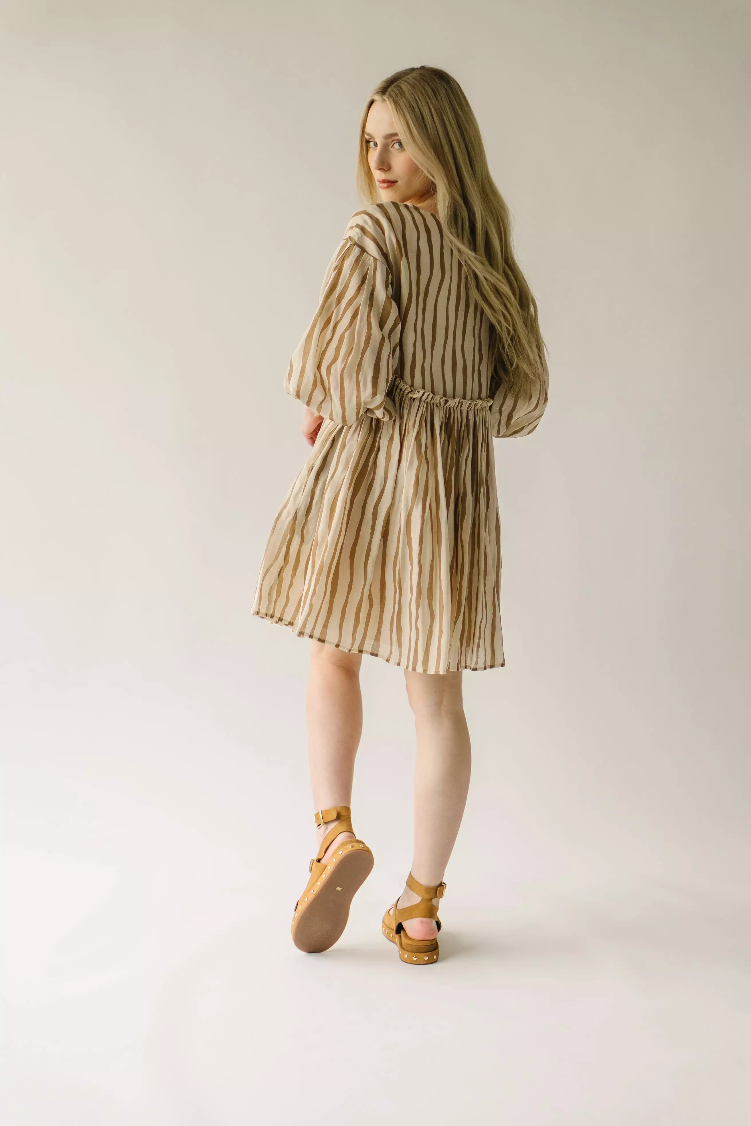 The Pampa Bubble Sleeve Babydoll Dress in Mocha Stripe