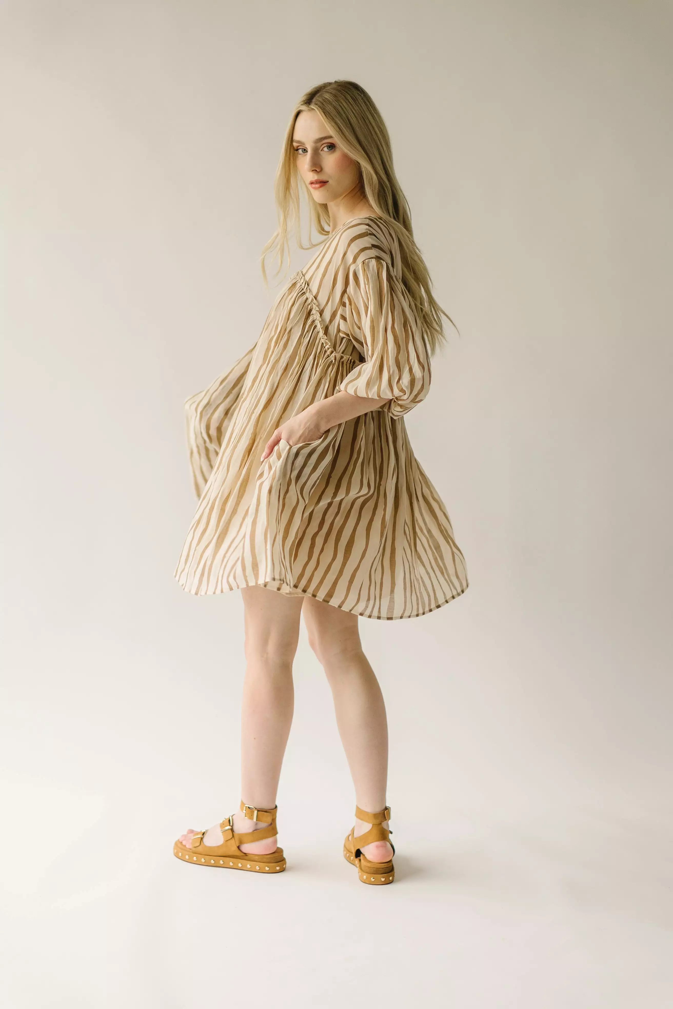 The Pampa Bubble Sleeve Babydoll Dress in Mocha Stripe